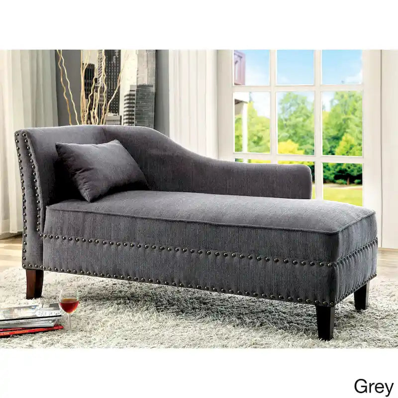 Divano lounge Sing con rivestimento in tessuto di transizione e finiture con borchie a chiodo by