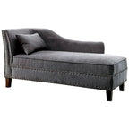 Divano lounge Sing con rivestimento in tessuto di transizione e finiture con borchie a chiodo by