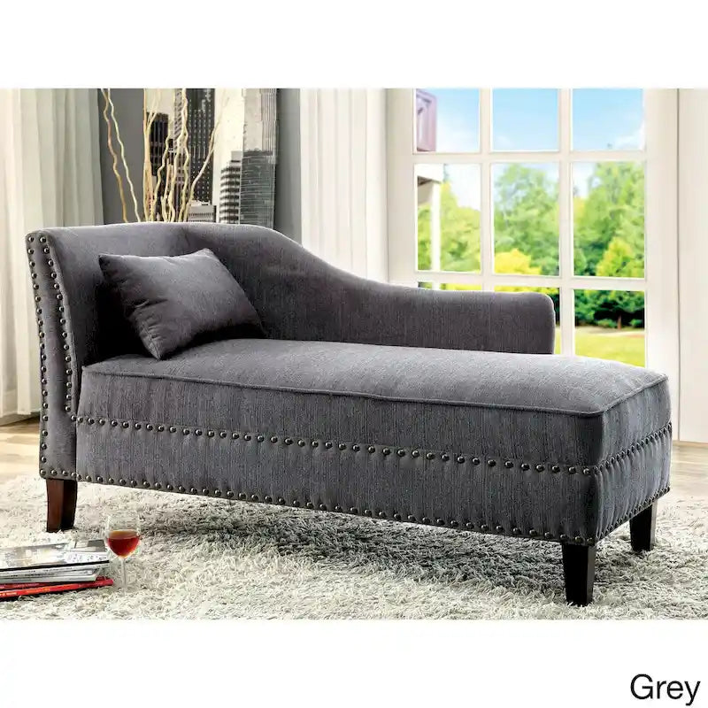 Divano lounge Sing con rivestimento in tessuto di transizione e finiture con borchie a chiodo by